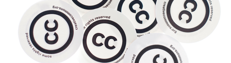 multiple stickers with the Creative Commons logo