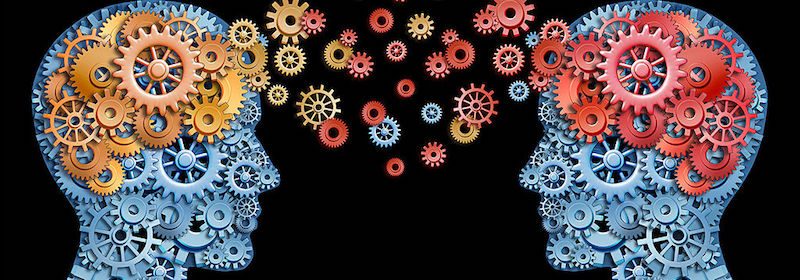 Two heads facing each other made up of cogs and wheels with coloured cogs floating between